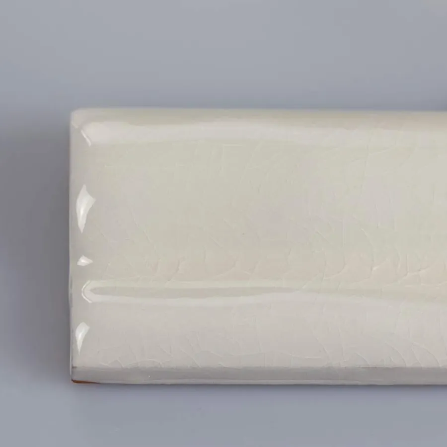 Cevica S.L. Bröstlister|Cremevitt Kakel|Kakel Mayfair - Krackelerad antikvit bröstlist 5 x 15 cm blank, lätt vågigt